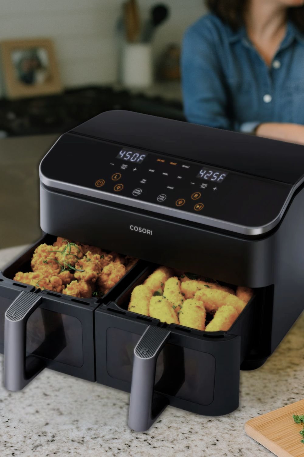 Dual Basket Air Fryer – cooking crispy fried chicken and breaded mozzarella sticks simultaneously. Demonstrates versatility and efficient meal prepping for snack lovers and home cooks