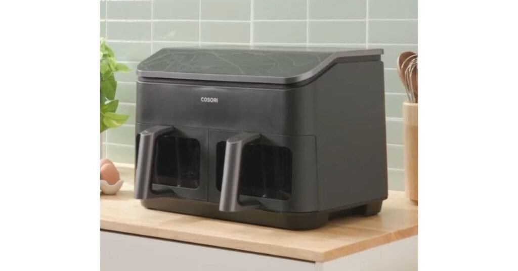 Under $200: 2025’s Ultimate Dual Basket Air Fryer—Why 85% Switched Fast! 7 COSORI Dual Basket Air Fryer placed on a kitchen counter, showcasing its size.